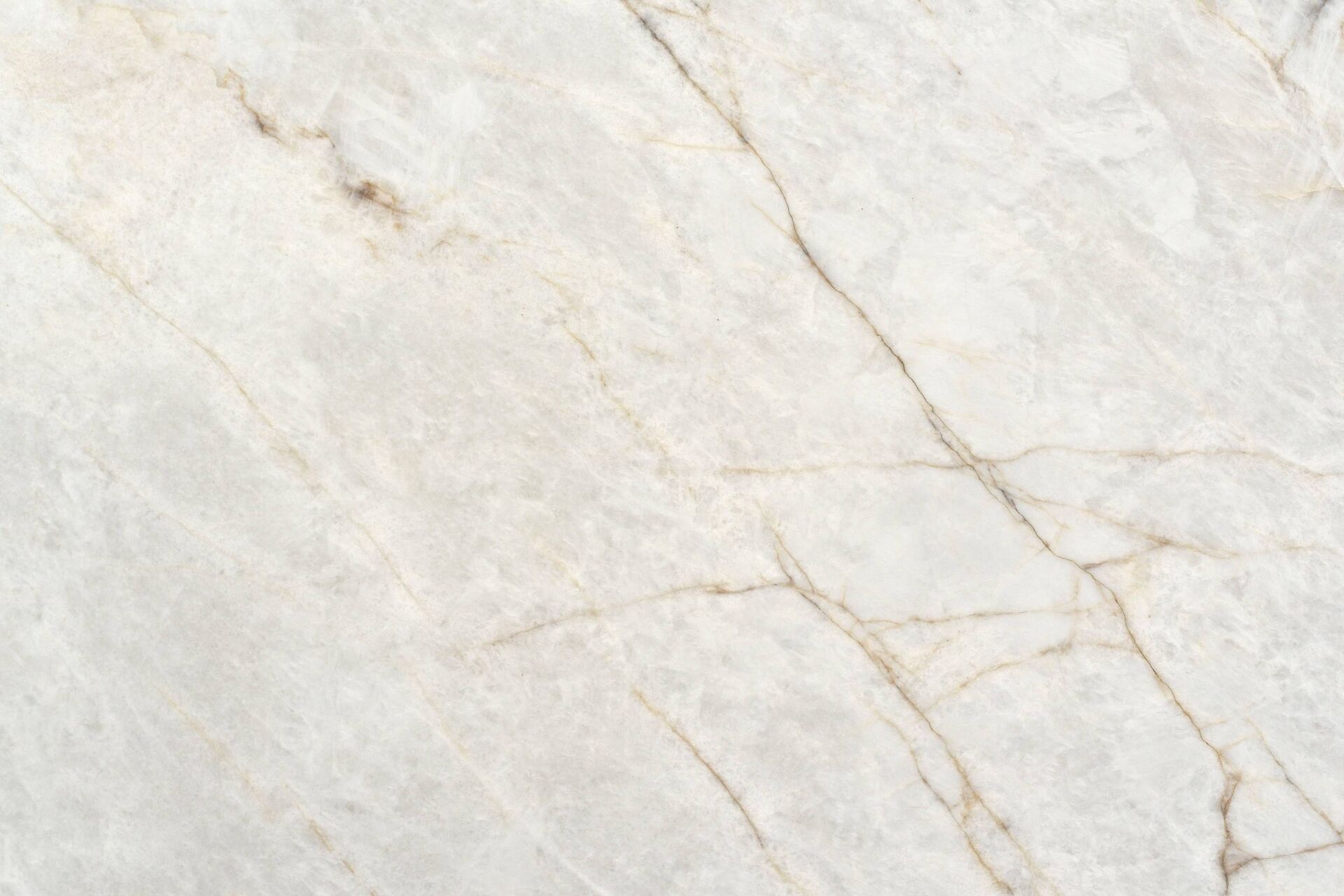 Cristallo White quartzite slab with gold rust veining