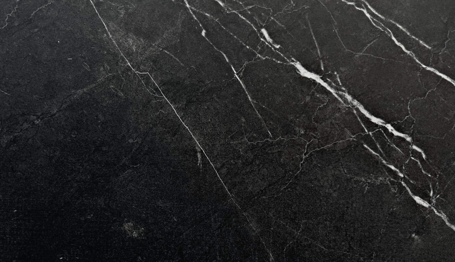 Nero Marquina black limestone slab with white veining