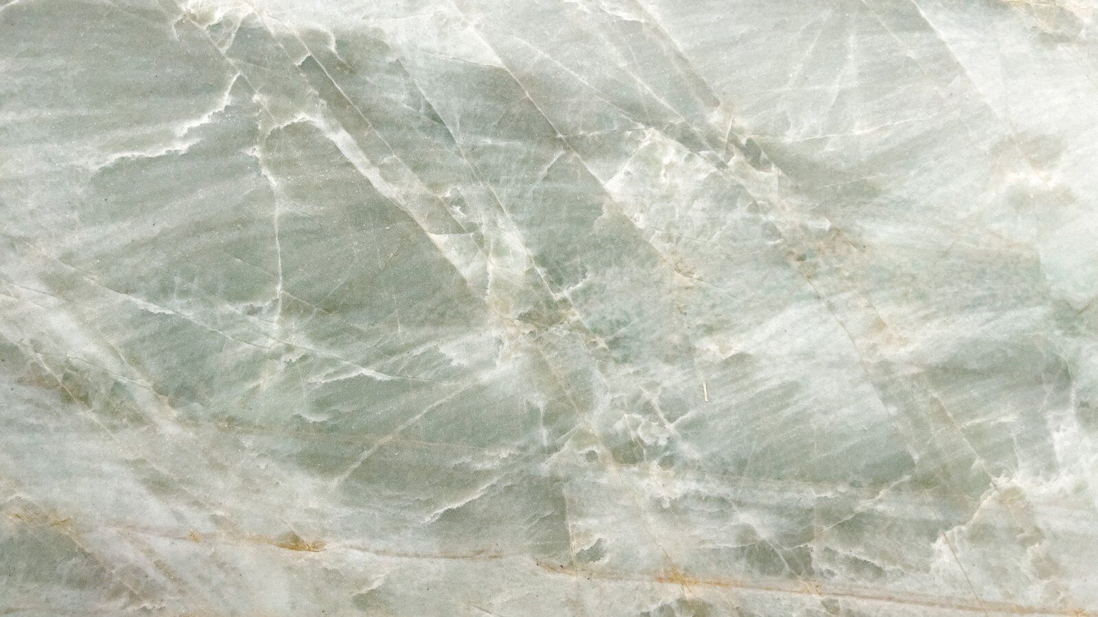 Aquamarine green quartzite slab with brown veining