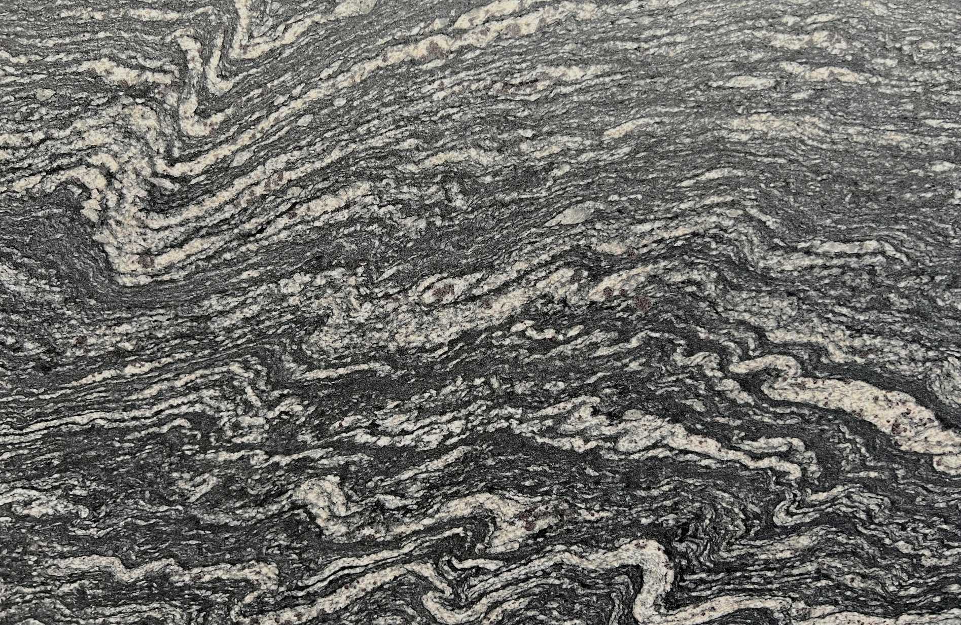 Lava Black granite slab with cream veining