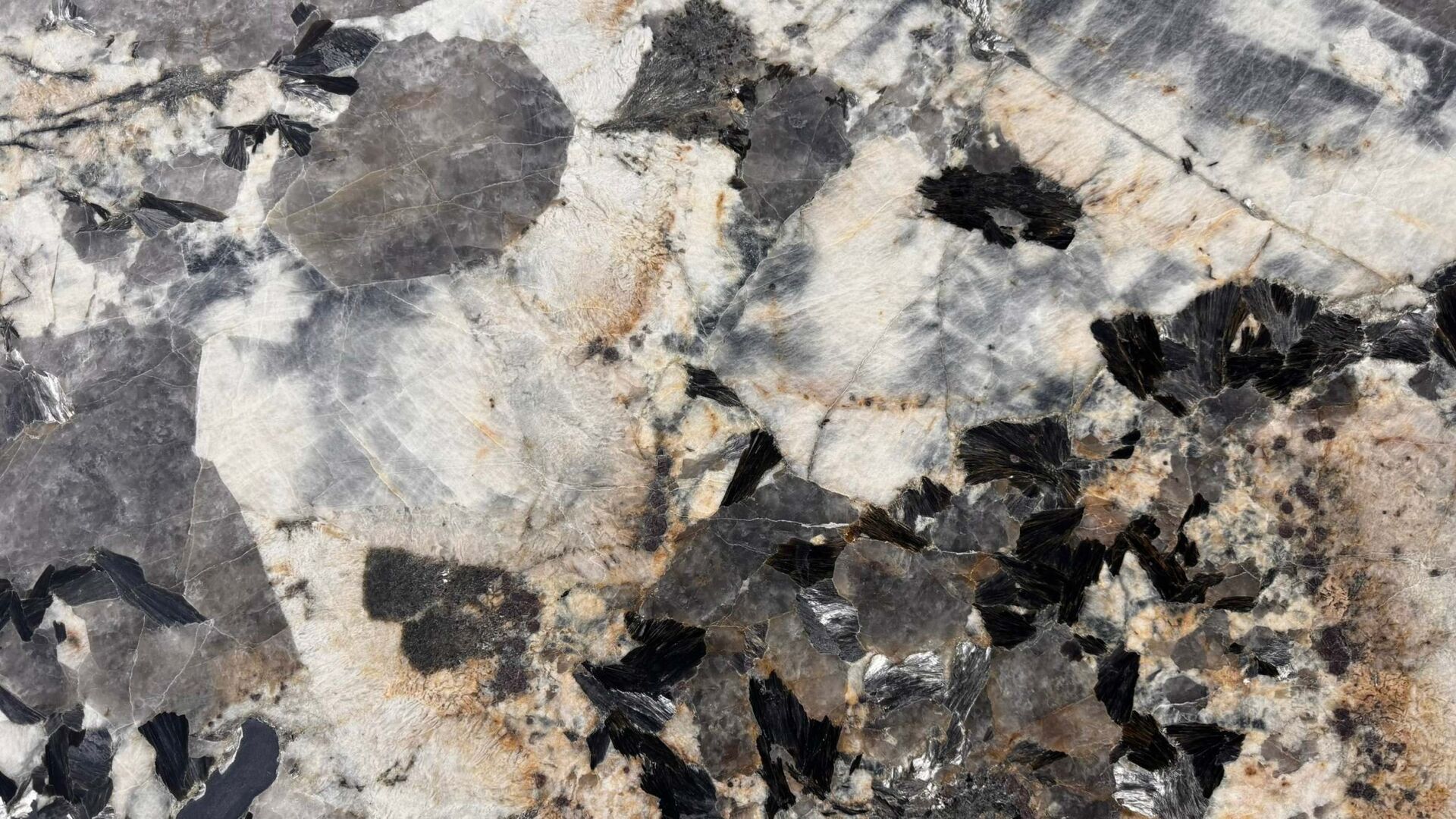 La Pampa brown granite slab with white veining